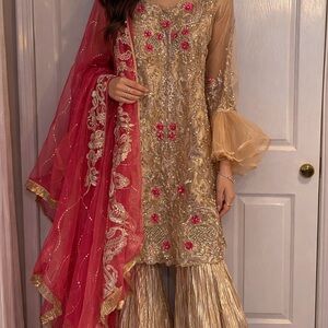 Elegant Gold and Pink Embroidered Outfit